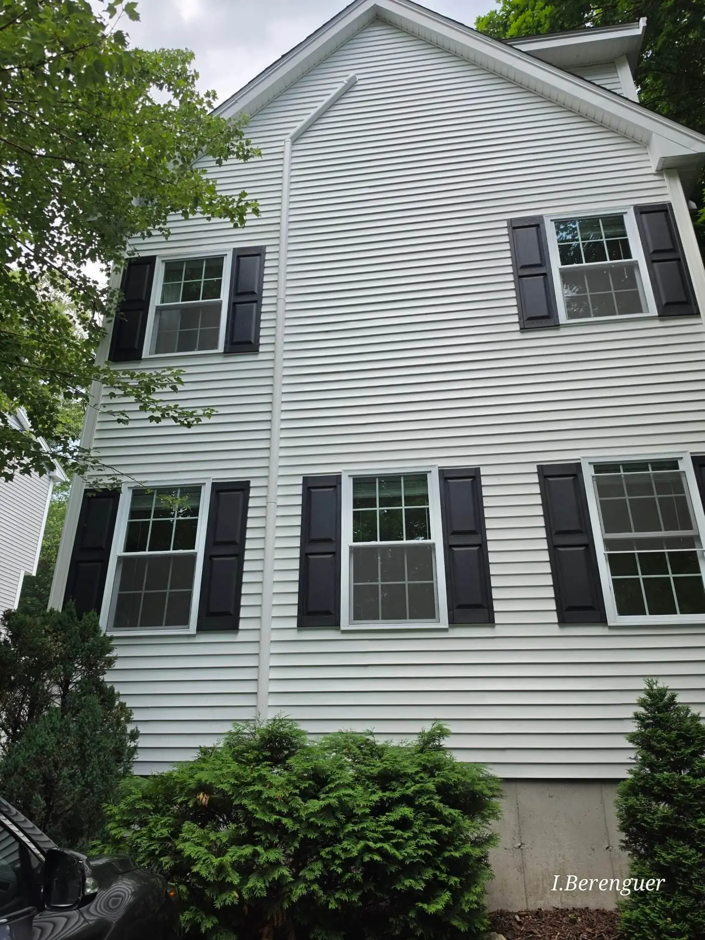 Three-story Littleton, MA home with a ductless heat pump serving the finished top floor