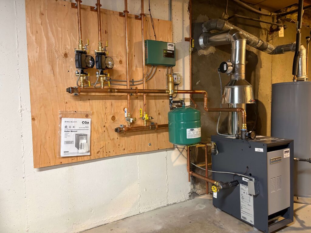 Weil-McLain gas boiler with new near-boiler piping installed in a Bedford, MA home