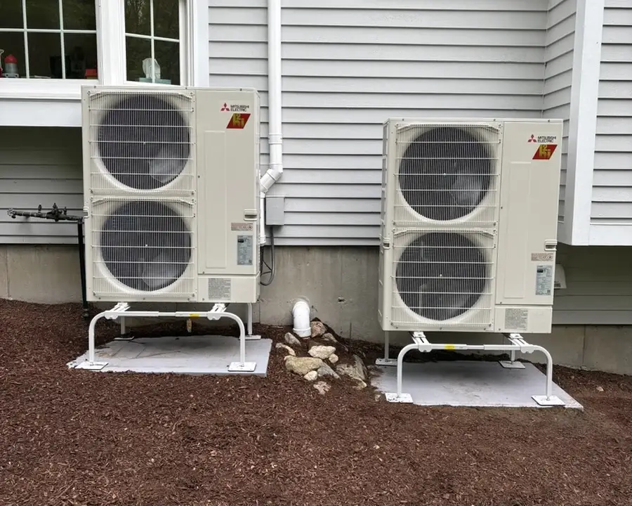 Two Mitsubishi Hyper-Heat outdoor units installed side by side