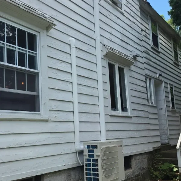 Mitsubishi MXZ-5D36NL outdoor heat pump on a new pad at a Lowell MA home